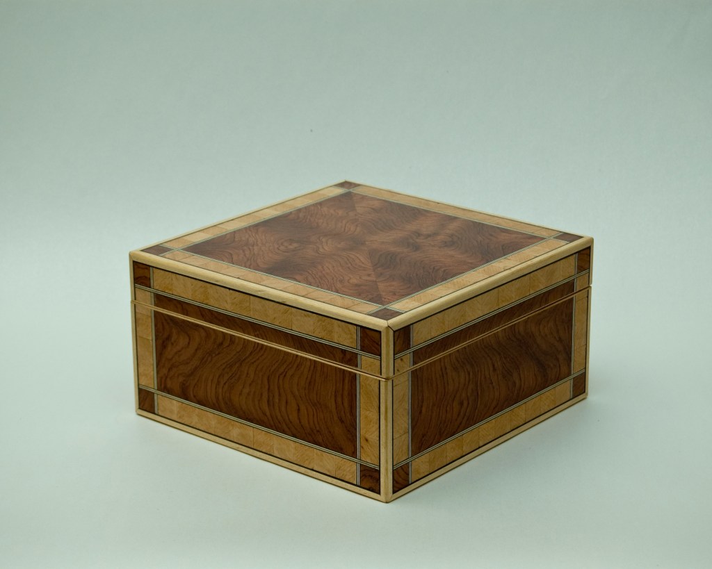 Adam's box crafted from bubinga and beech veneer with maple trim