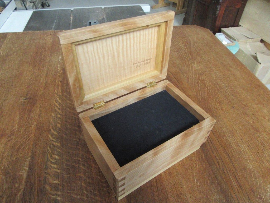 Laser etched message and velvet lined tray